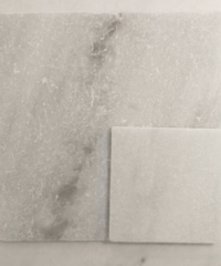 Frost White Tumbled marble features soft white tones and a naturally aged finish. Ideal for backsplashes, bathrooms, and floors, adding timeless texture and warmth.